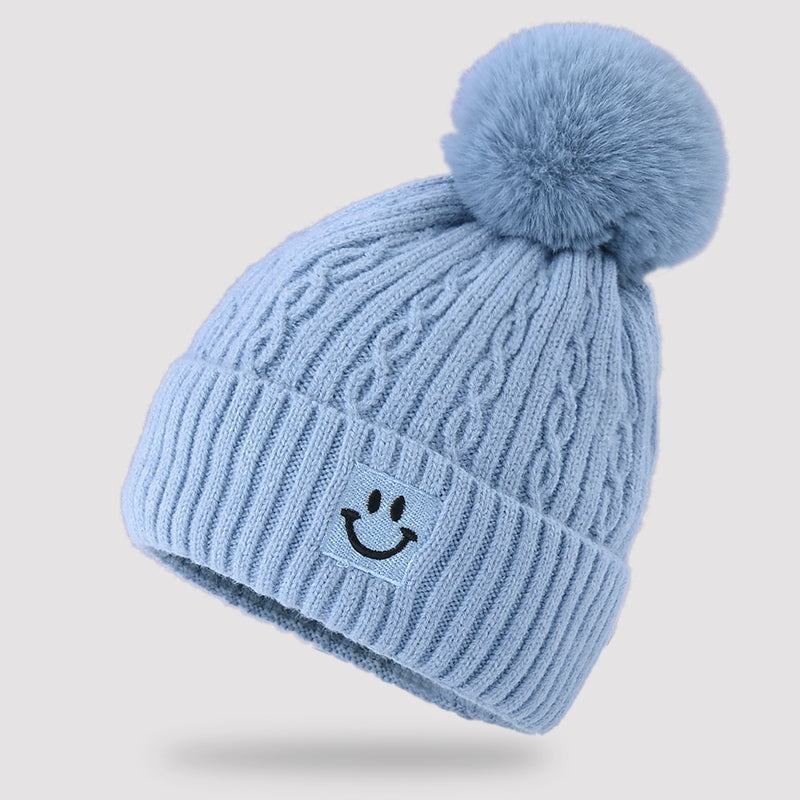 Embroidered smiling face wool hat