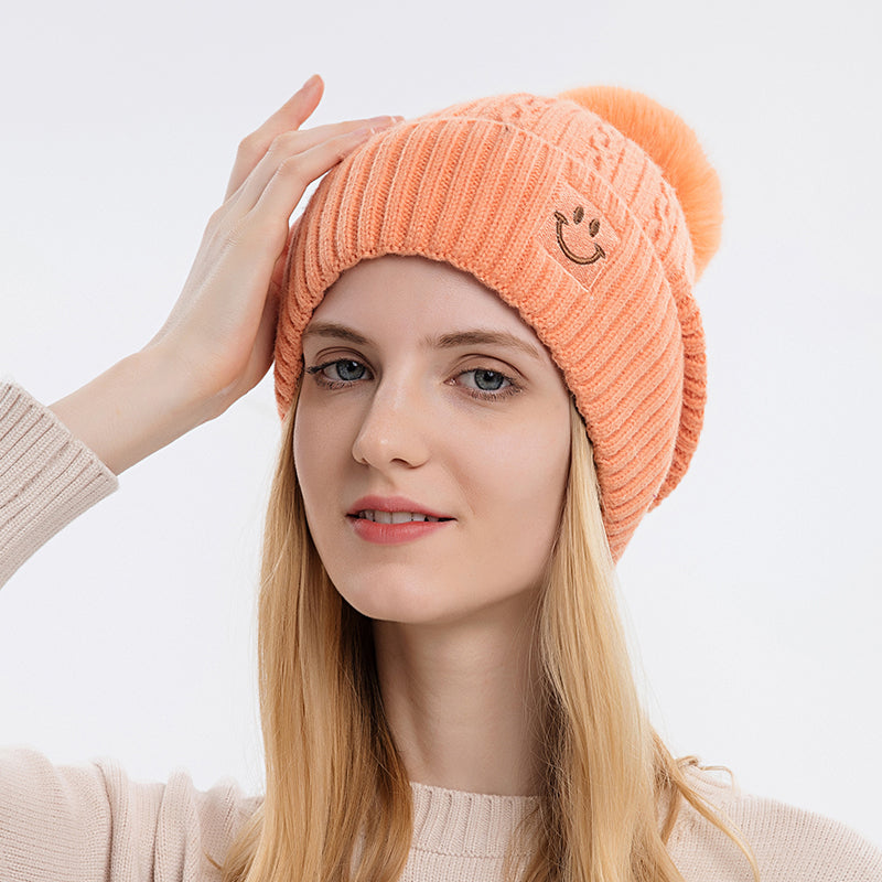 Embroidered smiling face wool hat