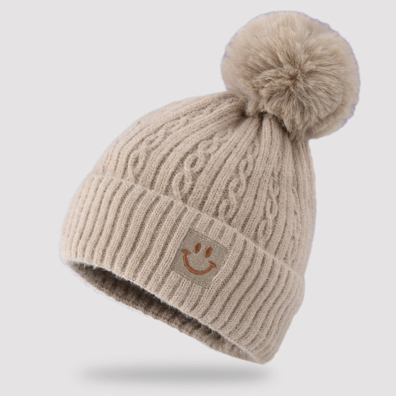 Embroidered smiling face wool hat