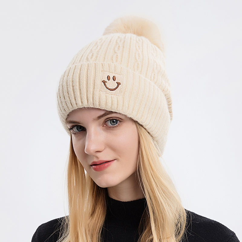 Embroidered smiling face wool hat