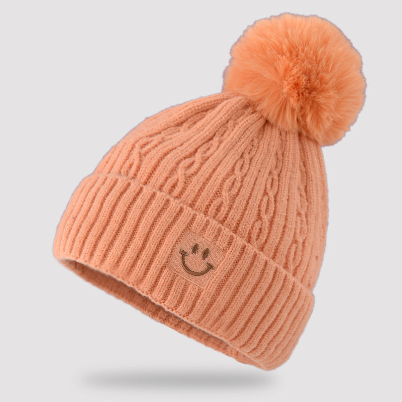 Embroidered smiling face wool hat