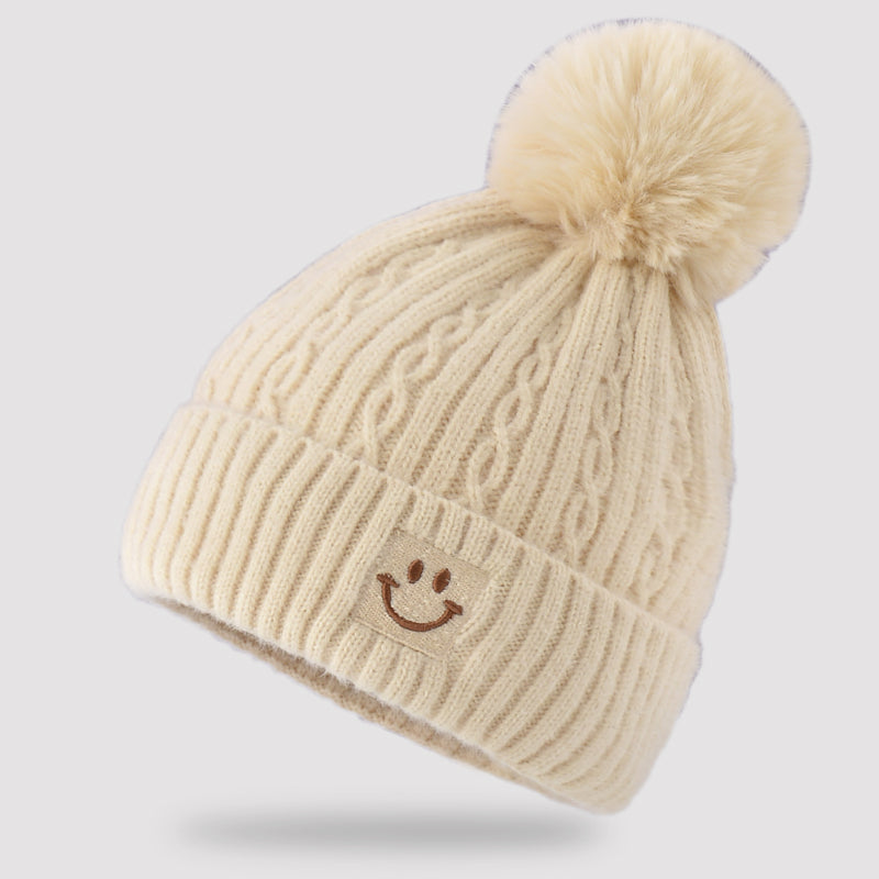 Embroidered smiling face wool hat