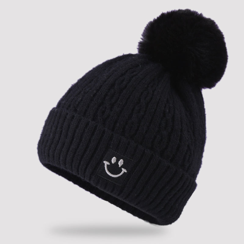 Embroidered smiling face wool hat